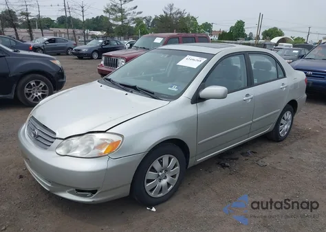 2004 Toyota Corolla Le z USA, uszkodzony, nr VIN 2T1BR32E84C259212